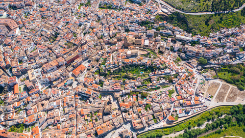 Aerial photo from drone to city of Loja and Church of the Incarnation with Moorish Alcazaba and Gorda Peak .Loja ,Granada, Andalusia, Spain, Europe (Series) photo