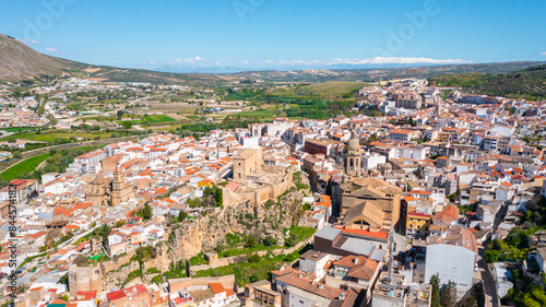 Aerial photo from drone to city of Loja and Church of the Incarnation with Moorish Alcazaba and Gorda Peak .Loja ,Granada, Andalusia, Spain, Europe (Series)