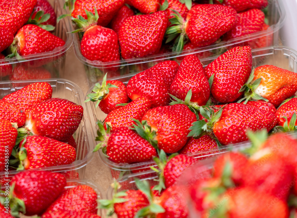 Red ripe strawberries as a background