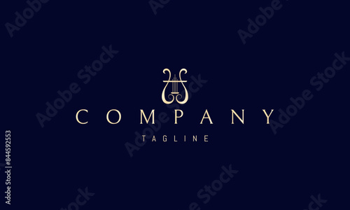 Vector golden logo with an abstract image of a harp in a linear style.