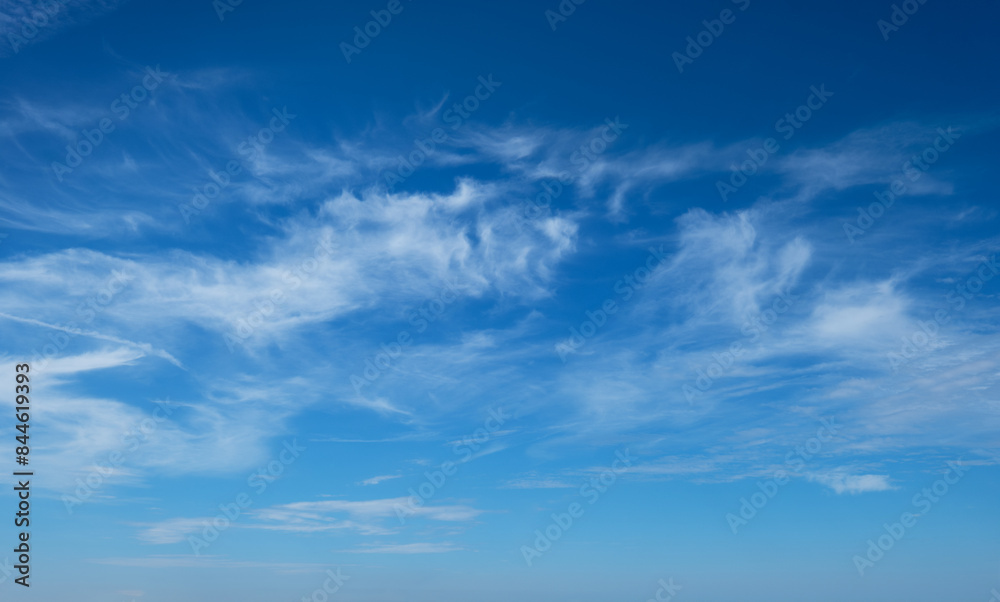 Clear Blue Sky with Wispy Clouds on a Sunny Day - Nature, Weather, and Serenity Clear Blue Sky with Wispy Clouds on a Sunny Day - Nature, Weather, and Serenity