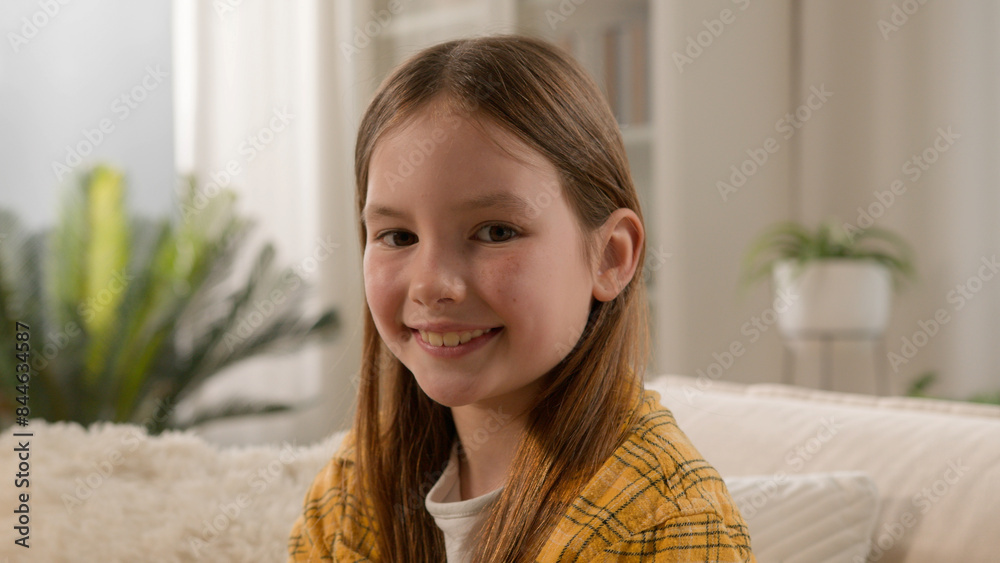 Close up joyful brunette smiling little Caucasian girl portrait daughter preschool kid looking camera friendly dental healthy toothy smile female child adoption custody home apartment happy childhood Close up joyful brunette smiling little Caucasian girl portrait daughter preschool kid looking camera friendly dental healthy toothy smile female child adoption custody home apartment happy childhood