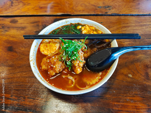 A close picture of a complete and fresh bowl of ramen