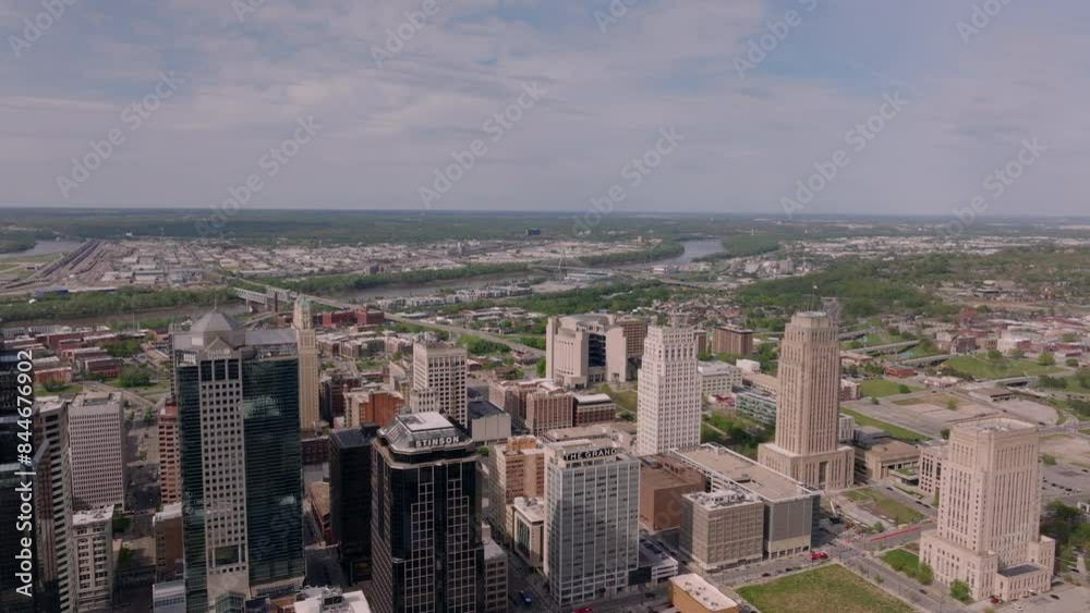 Vibrant skyline of kansas city with modern skyscrapers and urban landscapes under a clear sky. Captivating view of the city's architecture Vibrant skyline of kansas city with modern skyscrapers and urban landscapes under a clear sky. Captivating view of the city's architecture