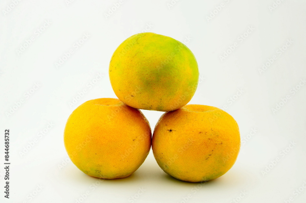 Three fresh ripe oranges with wihte background Three fresh ripe oranges with wihte background