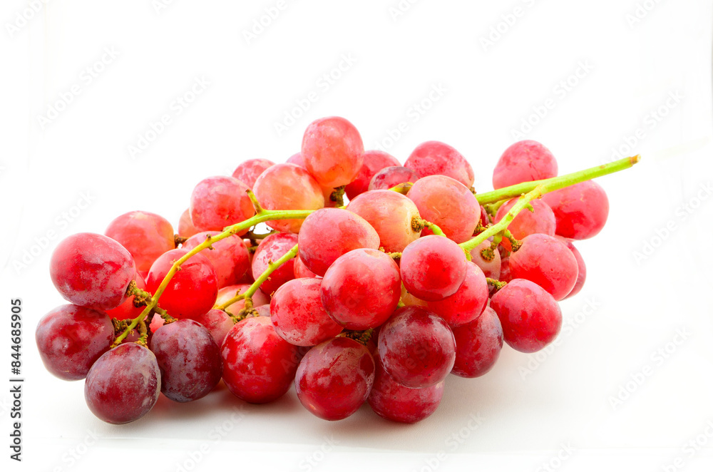 Fototapeta premium Bunch of red grape isolated with white background