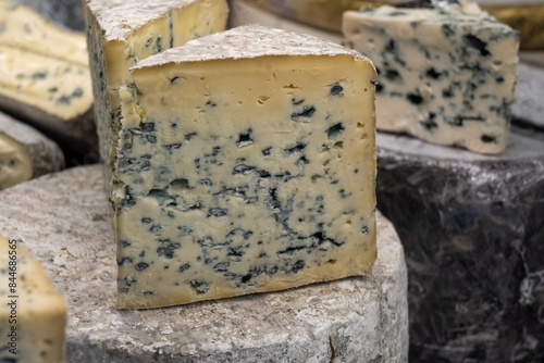 Bild auf Leinwand Piece of French blue cheese Roquefort, made from sheep milk in caves of Roquefor