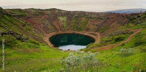 Visitors walking the volcano crater lip in Grimsnes-og Grafningshreppur photo