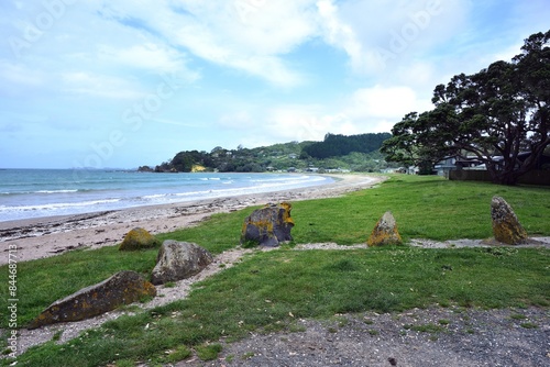 Boulders stopping vehicles getting onto the beach of Oakura photo