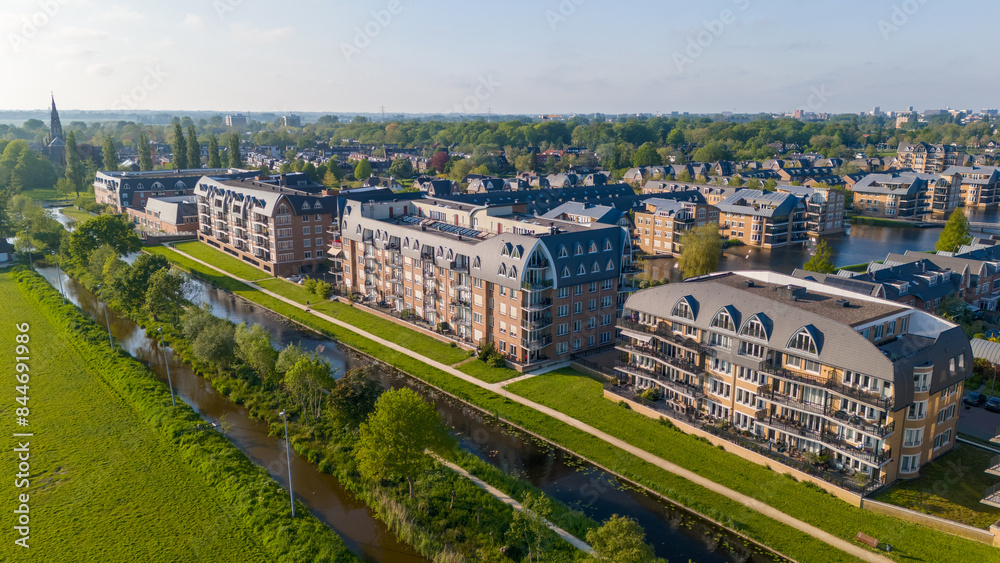 Aerial drone photo of a residential neighbourhood with luxury apartment buildings in Voorschoten, the Netherlands. Aerial drone photo of a residential neighbourhood with luxury apartment buildings in Voorschoten, the Netherlands.