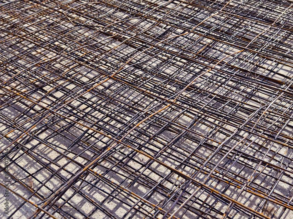 Fototapeta premium Background of metal bars at the construction site