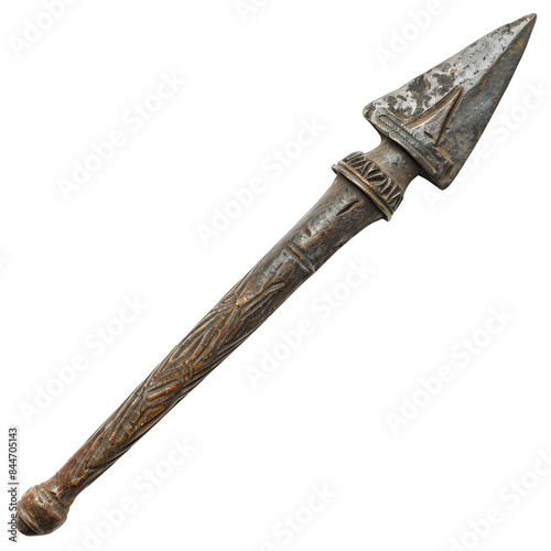 Ancient metal spearhead with detailed engravings on the handle, showcasing historical craftsmanship and weaponry. photo