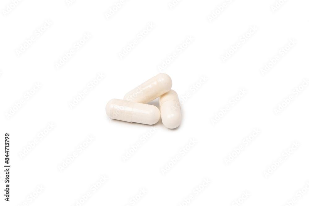 White pill capsule isolated on a white background. White pill capsule isolated on a white background.