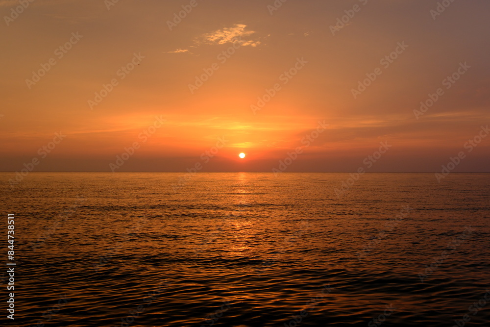 Naklejka premium sunset over the Black sea, view from the beach