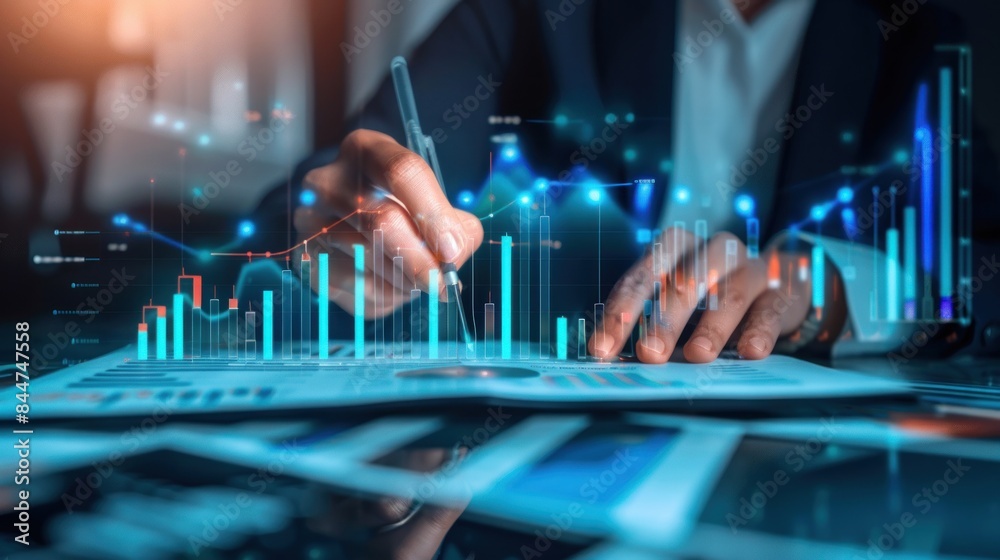 analysis working with the latest financial results. Analysis of sales forecast graphs, financial accounting with hand writing Abstract digital effect for background analysis working with the latest financial results. Analysis of sales forecast graphs, financial accounting with hand writing Abstract digital effect for background