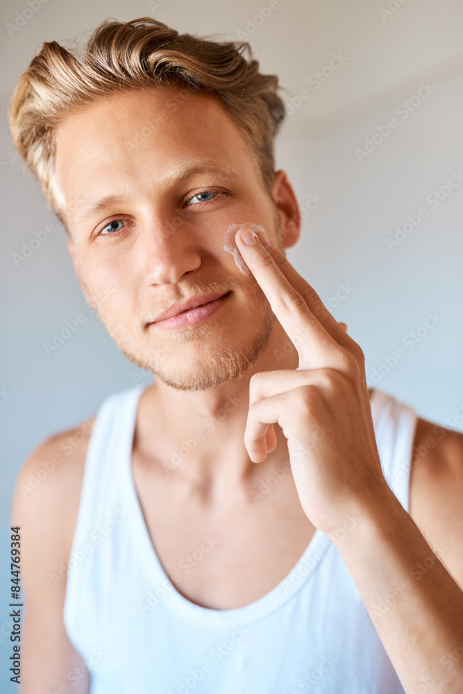 Face cream, natural and portrait of man with beauty, skincare and facial treatment at home. Smile, cosmetic and male person with dermatology sunscreen, lotion or spf for health routine in morning. Face cream, natural and portrait of man with beauty, skincare and facial treatment at home. Smile, cosmetic and male person with dermatology sunscreen, lotion or spf for health routine in morning.