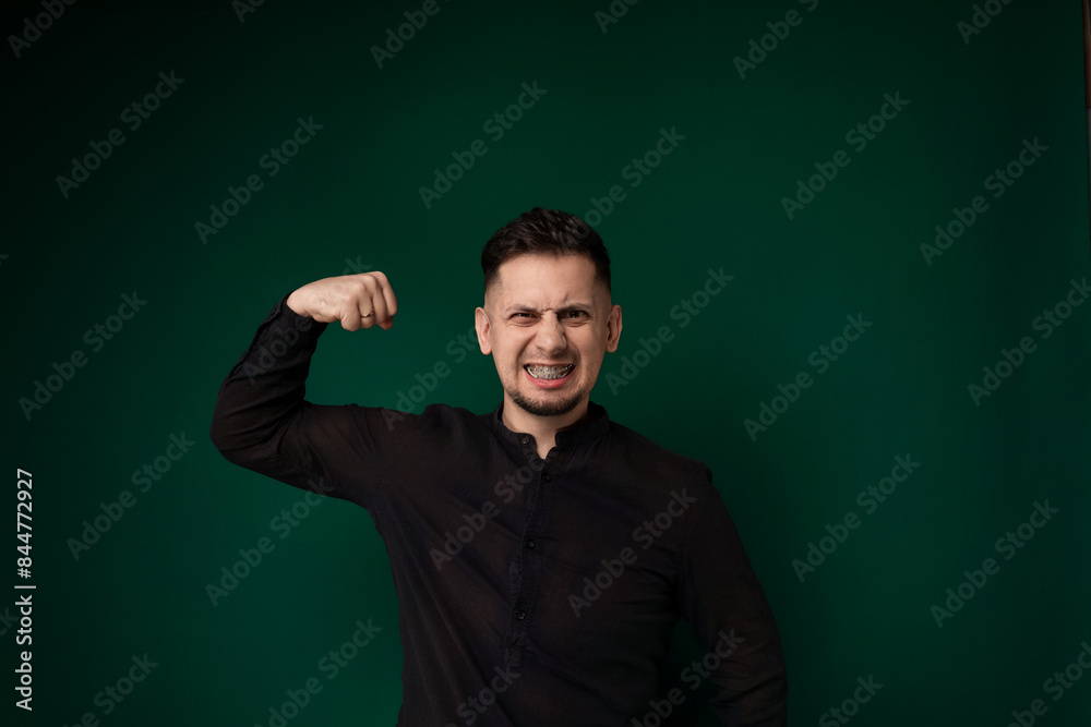 Man in Black Shirt Posing for Picture Man in Black Shirt Posing for Picture