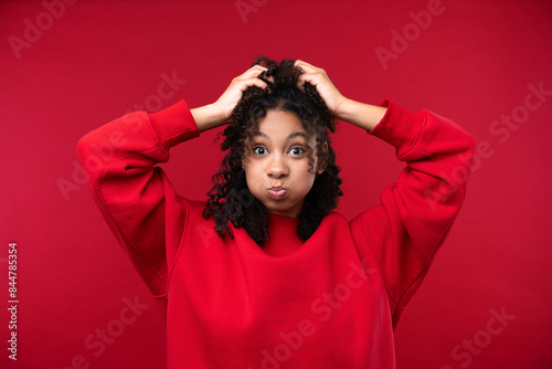Happy emotions concept. Positive and beautiful young woman in studio