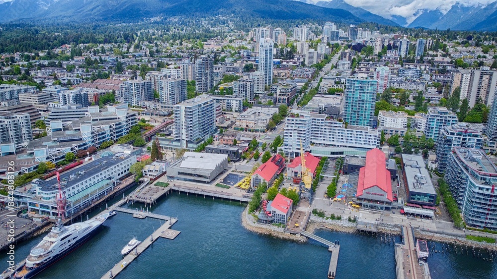 Obraz premium Wide aerial view of The Shipyards District and Lower Lonsdale in North Vancouver