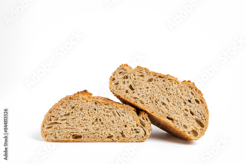 A loaf of sourdough bread cut in half