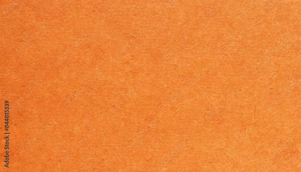 Fototapeta premium Dusty, grainy, rough, earthy orange paper texture with visible fibers, for minimalistic art or backgrounds.