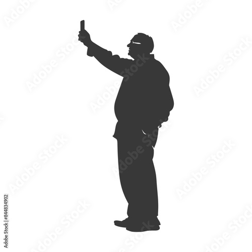 Silhouette of Man Taking Selfie with Smartphone, Arm Raised.