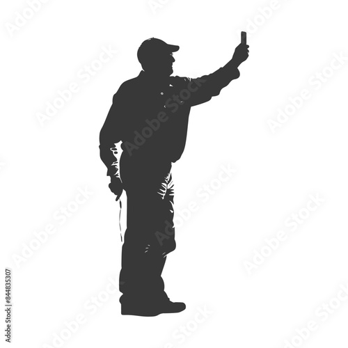 Silhouette: Man in Cap Holding Device Aloft, Against White Background