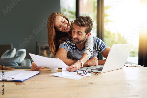 Documents, finance and laptop with happy couple in home together for bank investment or savings. Accounting, budget or computer with smile of man and woman in apartment for money or tax planning