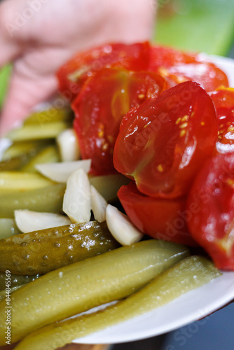 Brined perfection: A medley of pickles and tomatoes.
