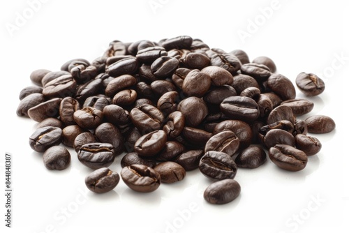 coffee beans are scattered on a white background photo