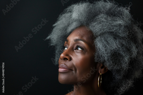 60 year old woman posing for a senior photo