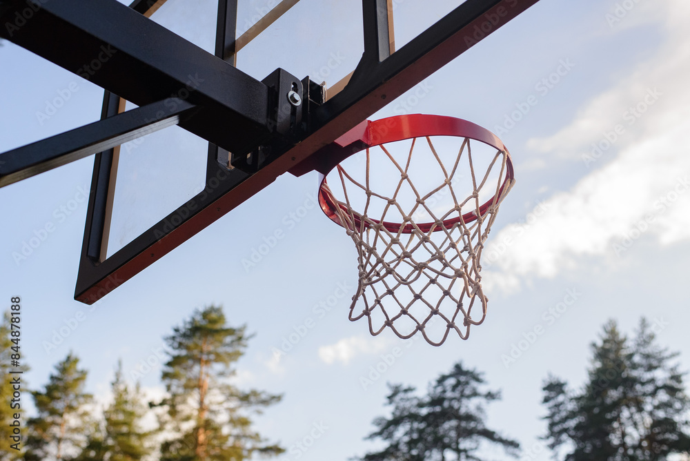 basketball hoop against blue sky basketball hoop against blue sky