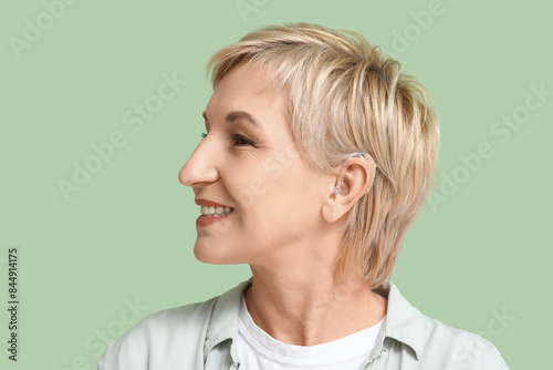 Mature woman with hearing a...