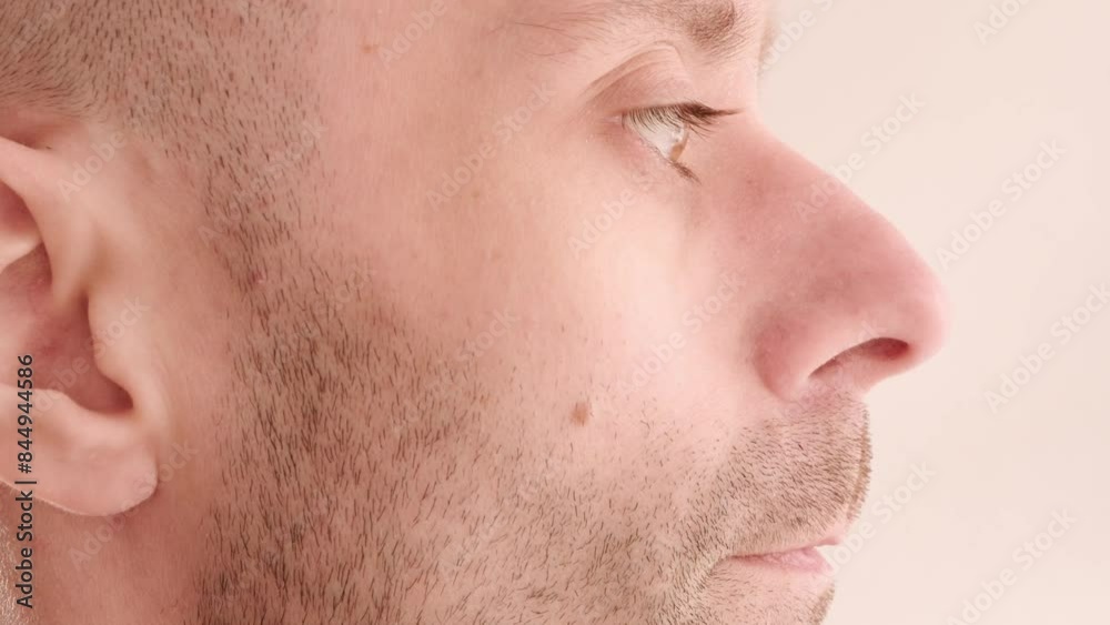 Male Brown Eyes close-up, young Caucasian man looking, Masculine beauty, vision examination, myopia, eye fatigue, color perception Male Brown Eyes close-up, young Caucasian man looking, Masculine beauty, vision examination, myopia, eye fatigue, color perception