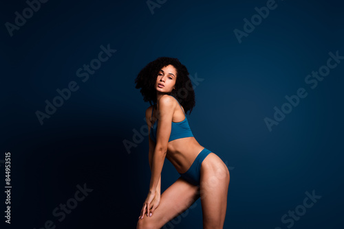 No retouch photo of seductive pretty lady underwear lingerie enjoying self acceptance empty space isolated blue color background © deagreez