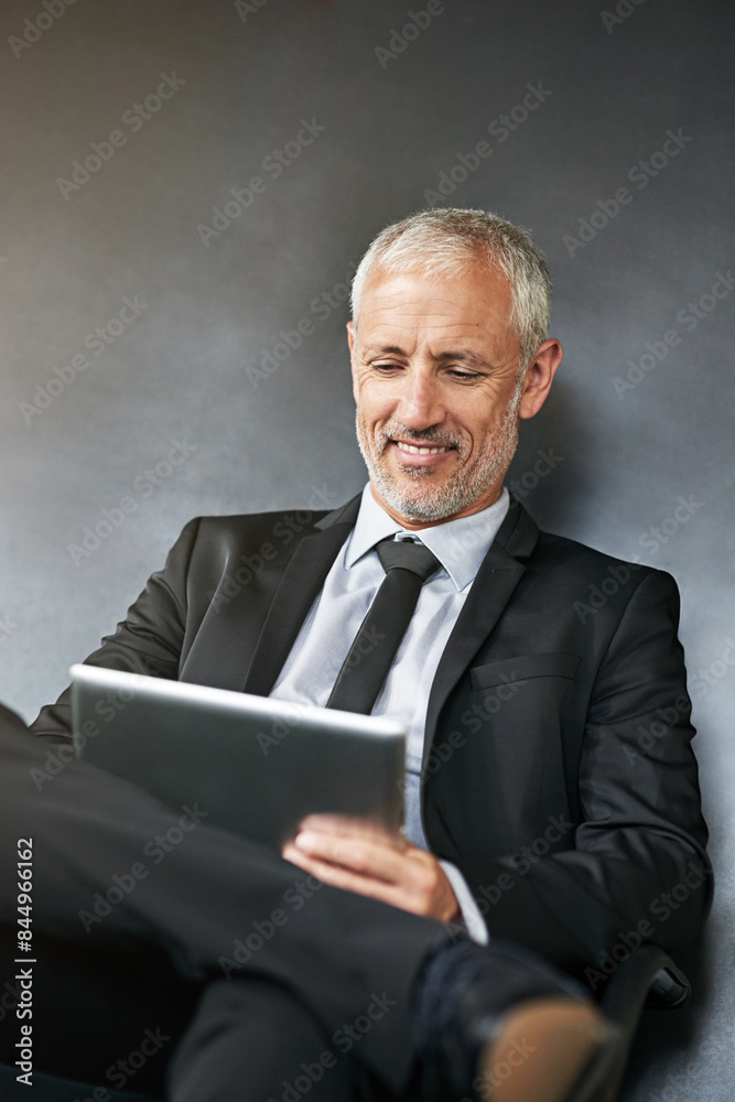 Man, tablet and reading on studio background for business, research for financial project or crypto. Male manager, mobile technology and planning for stock market, happiness with blockchain app Man, tablet and reading on studio background for business, research for financial project or crypto. Male manager, mobile technology and planning for stock market, happiness with blockchain app