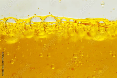 Wallpaper Mural Macro shot of oil gelatin capsules dissolve in water Torontodigital.ca