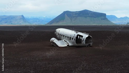 Aerial view of the Solheimasandur Plane Wreck in Iceland. Wrecked old plane Dakota on the black sand beach, south coast of Iceland