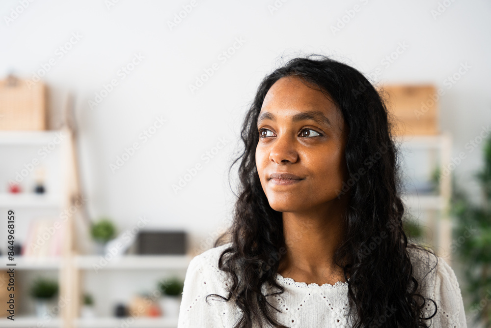 Closeup portrait of pensive Indian woman with copy space Closeup portrait of pensive Indian woman with copy space