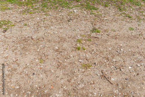 Floor with stones and a bit of grass photo