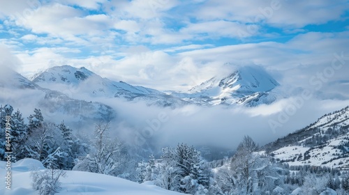 Cloudy mountain landscape covered in snow © 2rogan