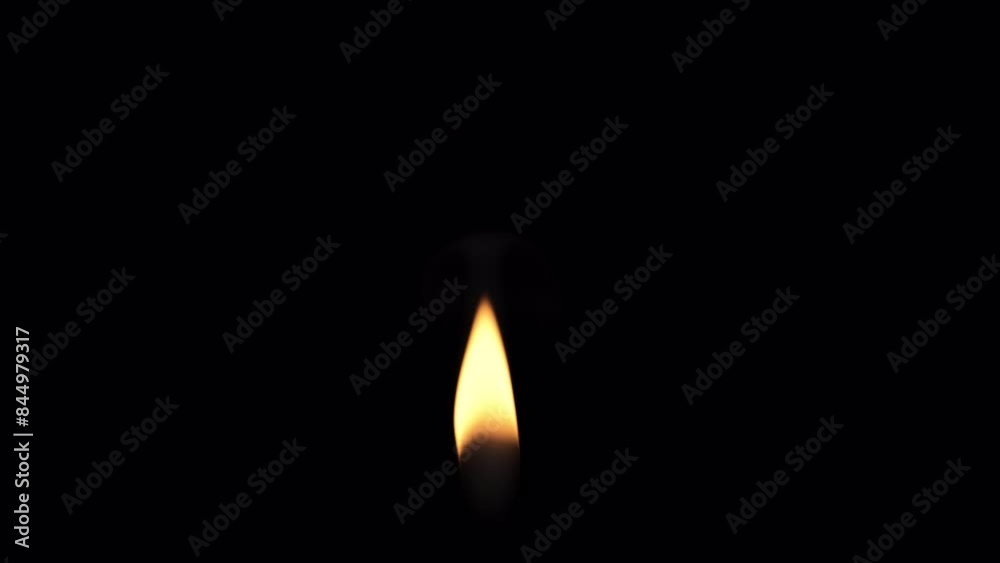 Candle flame burning in slow motion with slight smoke, alpha channel ...