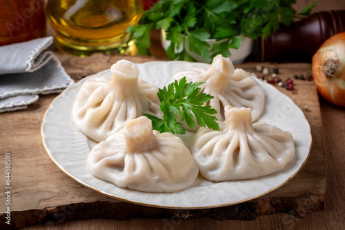 Obraz na płótnie Traditional Georgian dish khinkali - Hinkali - Boiled khinkali with lamb or beef or cheese w salonie