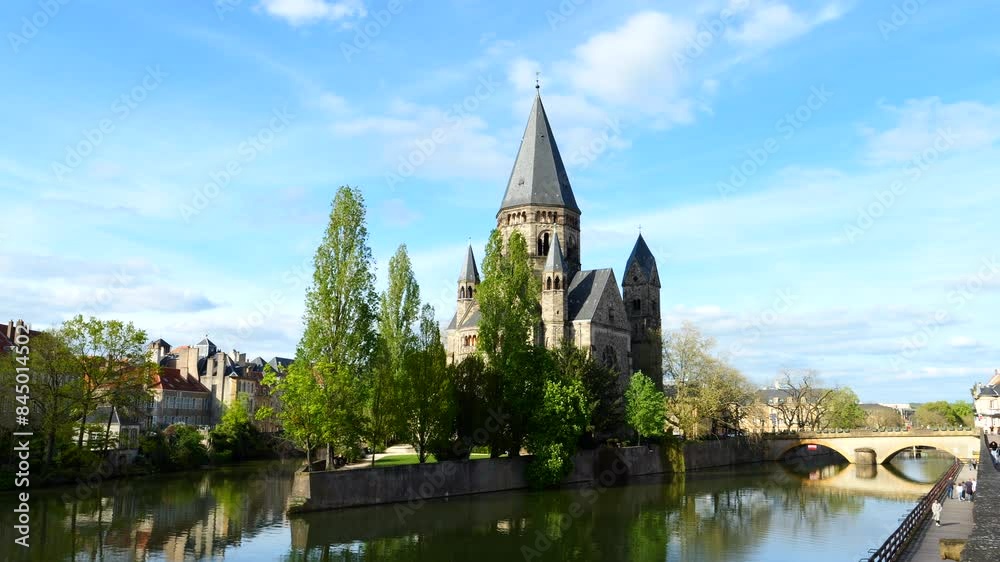 Temple Neuf (New Temple) Next To Pont des Roches On Moselle River In Metz, France. wide static shot Temple Neuf (New Temple) Next To Pont des Roches On Moselle River In Metz, France. wide static shot
