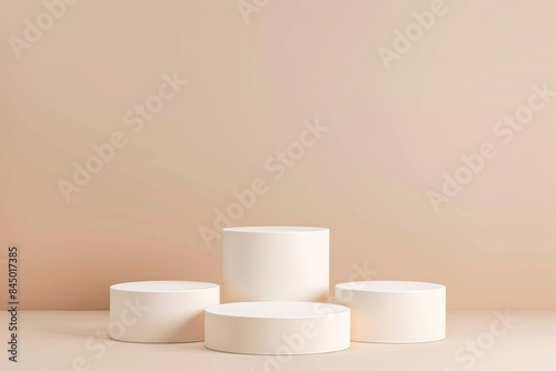 four 3D realistic tiered podium standing on a pastel beige background