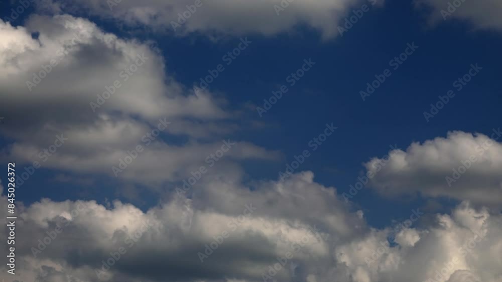 Time lapse, Dramatic clouds in the blue sky, Austria, Europe Time lapse, Dramatic clouds in the blue sky, Austria, Europe