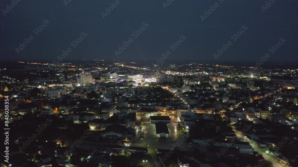 Aerial view of residential neighborhood roofs. Urban housing development from above. Top view. Real estate in Kalasin, Isan province city, Thailand. Property real estate. Aerial view of residential neighborhood roofs. Urban housing development from above. Top view. Real estate in Kalasin, Isan province city, Thailand. Property real estate.
