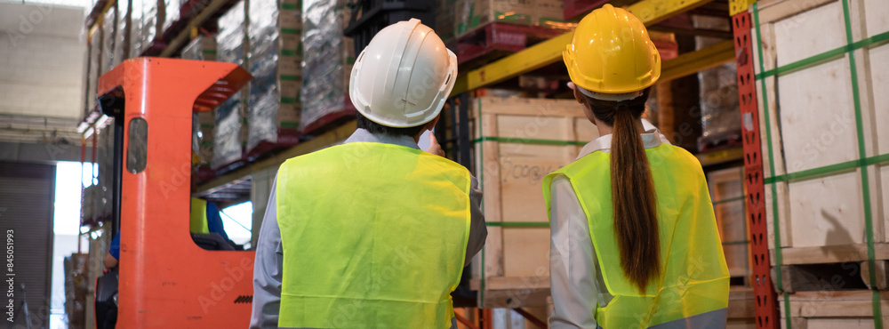 custom made wallpaper toronto digitalBack view of supervisor and assistant looking at working process at warehouse distribution. Business logistic concept