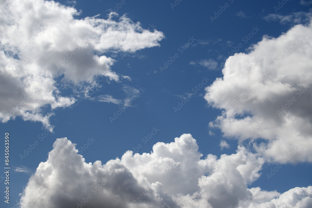 Blue sky mostly covered with white, fluffy clouds Blue sky mostly covered with white, fluffy clouds