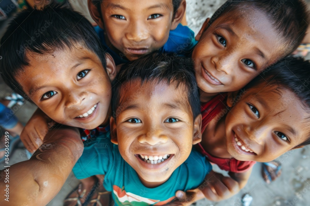 Group of happy asian children smiling and looking at the camera. Group of happy asian children smiling and looking at the camera.